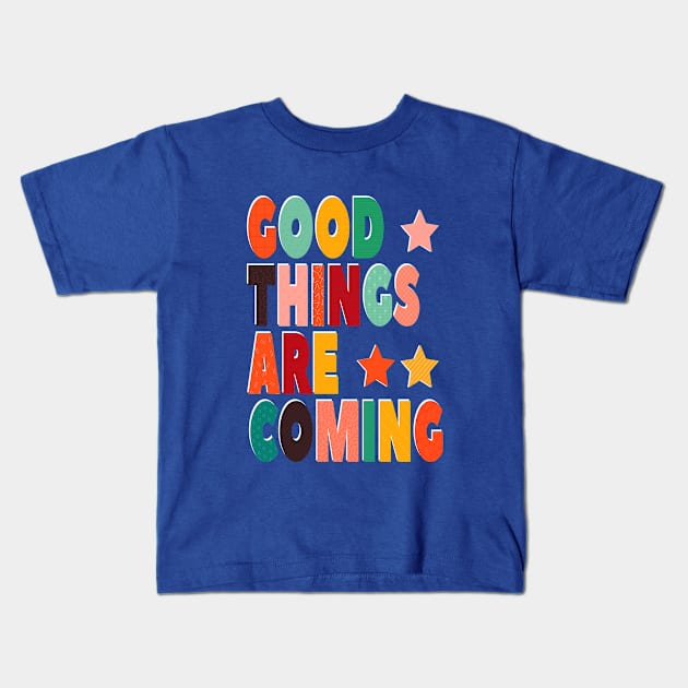 GOOD THINGS ARE COMING Kids T-Shirt by showmemars